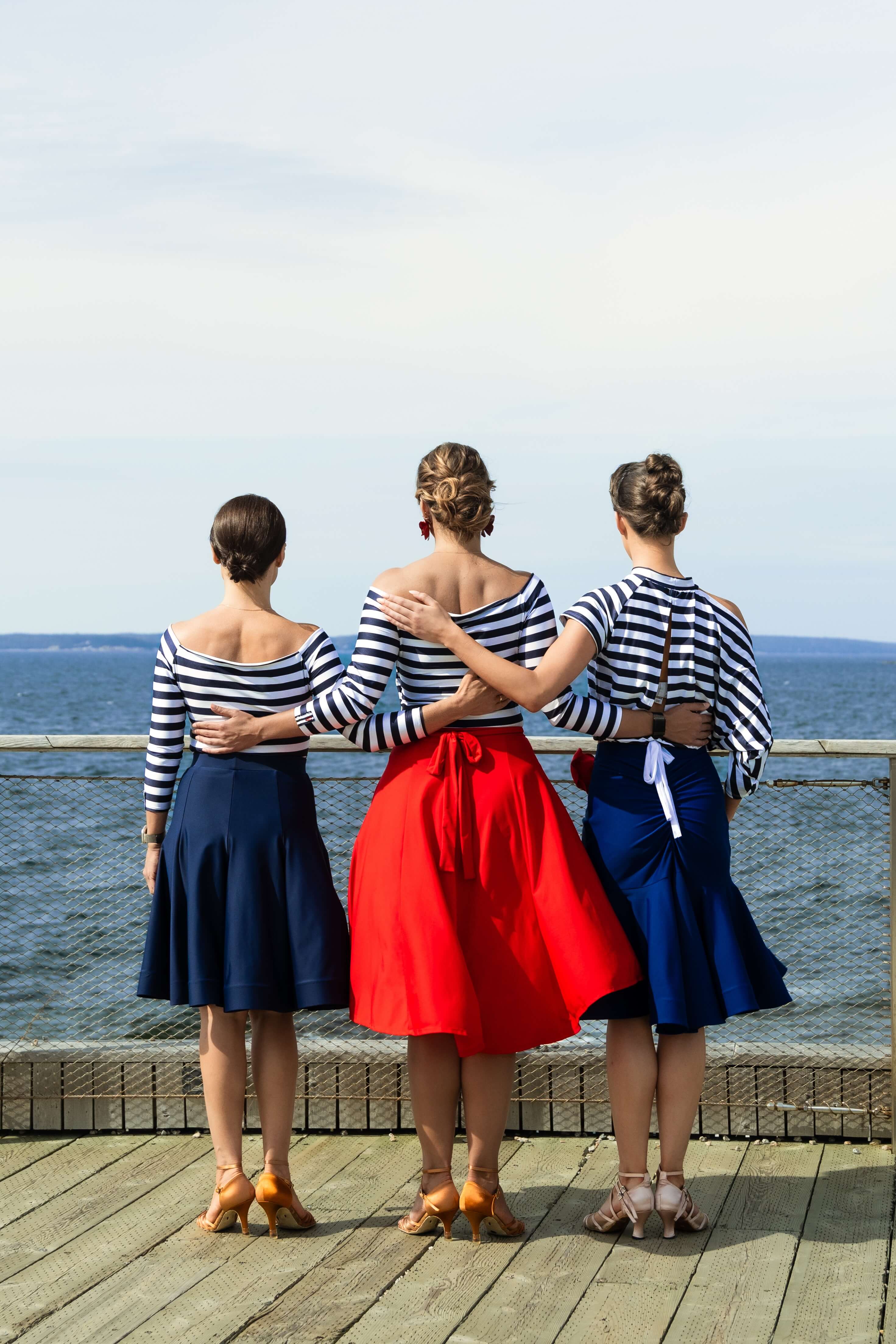 Maritime collection; red and blue skirts swirling